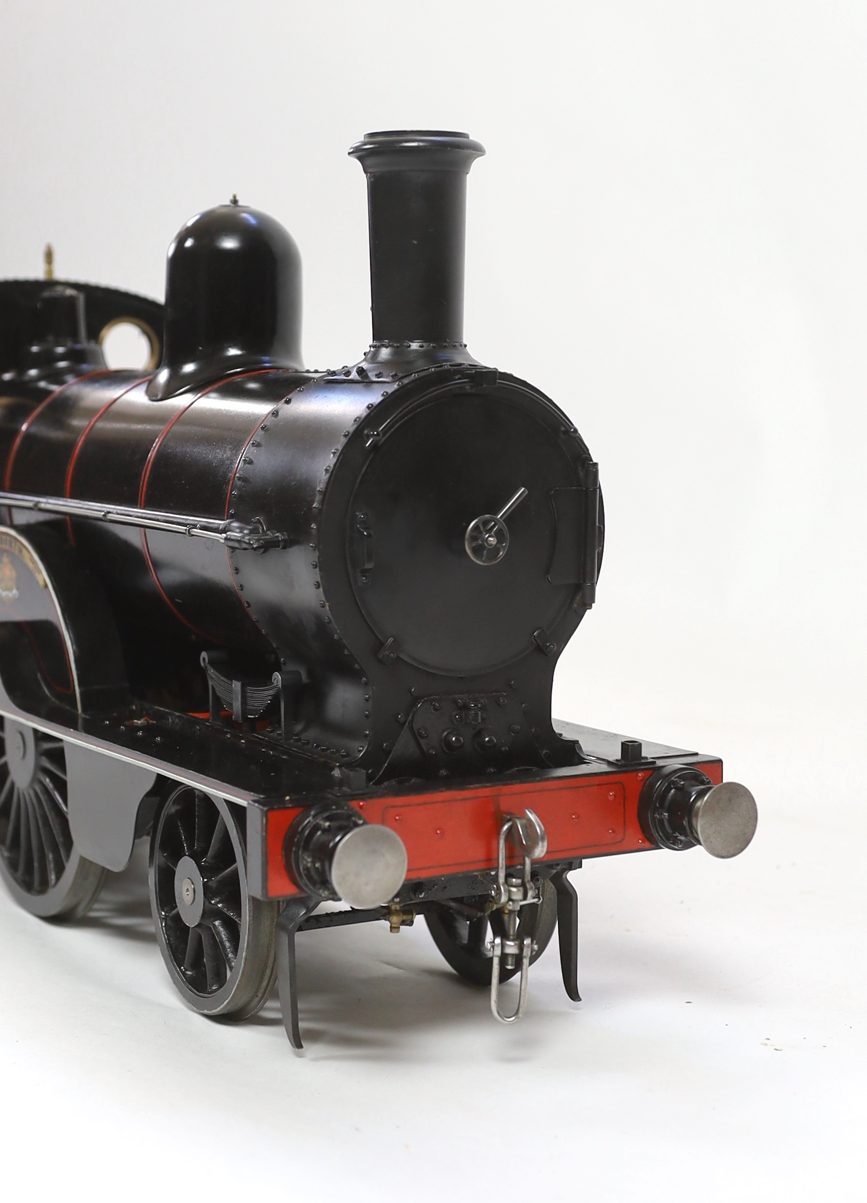 A very finely engineered scratch-built 5” gauge live steam model of a LNWR (London and North Western Railway) Jumbo 2-4-0 tender locomotive, No. 1045 ‘Whitworth’